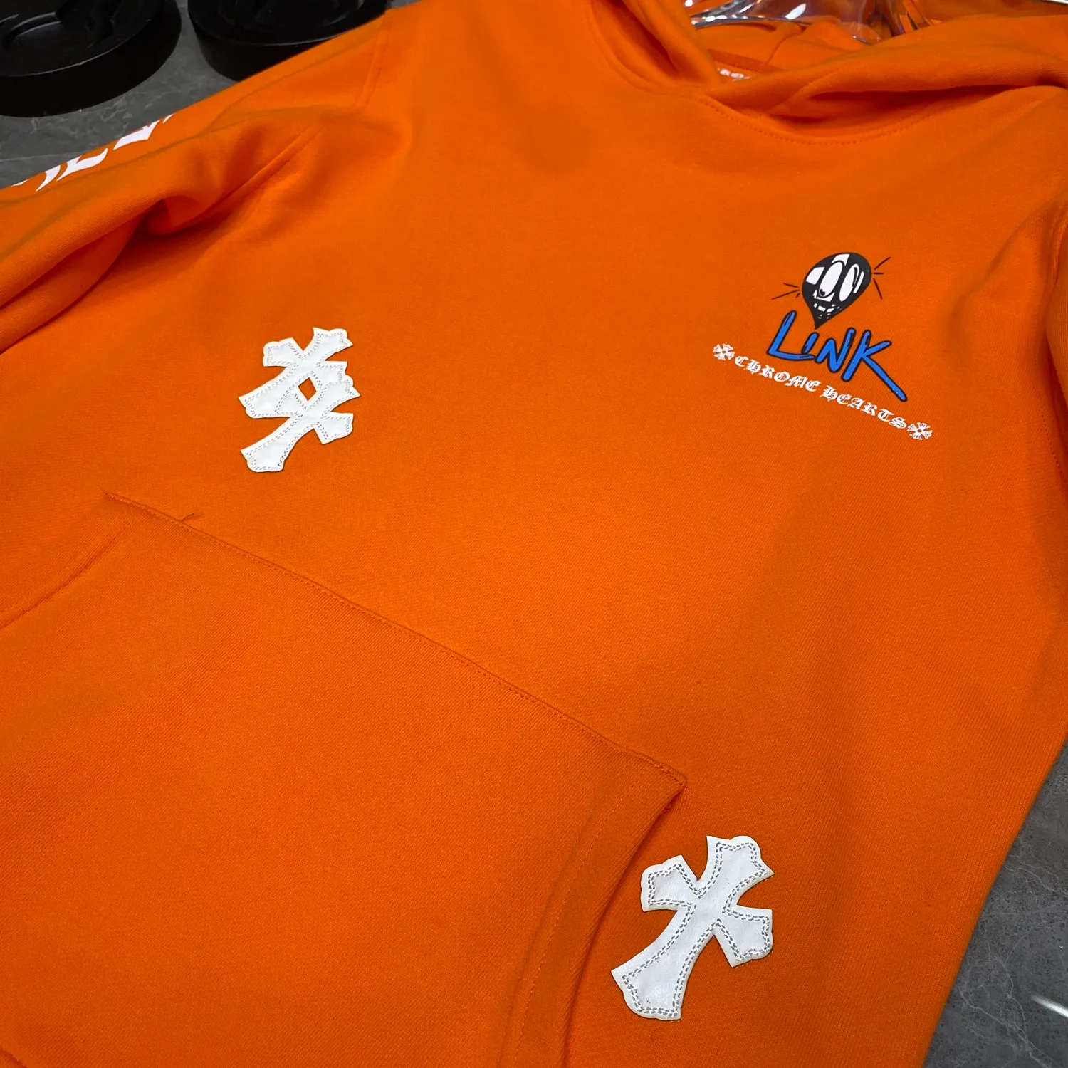P240 Chrome Hearts Autumn and Winter 2025 Available at counters simultaneously ❤️ Chrome Hearts Matty Boy cross embroidery leather graffiti hoodie sweatshirt SVIP customized version! ! High version of Pinpi! ! Imported environmentally friendly glue printing and dyeing. Improved customized version 1:1. High-quality fabric with high weight. Recommended color: customized orange. Size: S, M, L, XL.